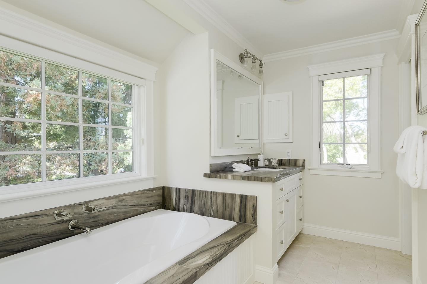 277 Delphi Circle Los Altos, CA 94022 - Photo 22 of 28 a kitchen with a stove a sink and a window
