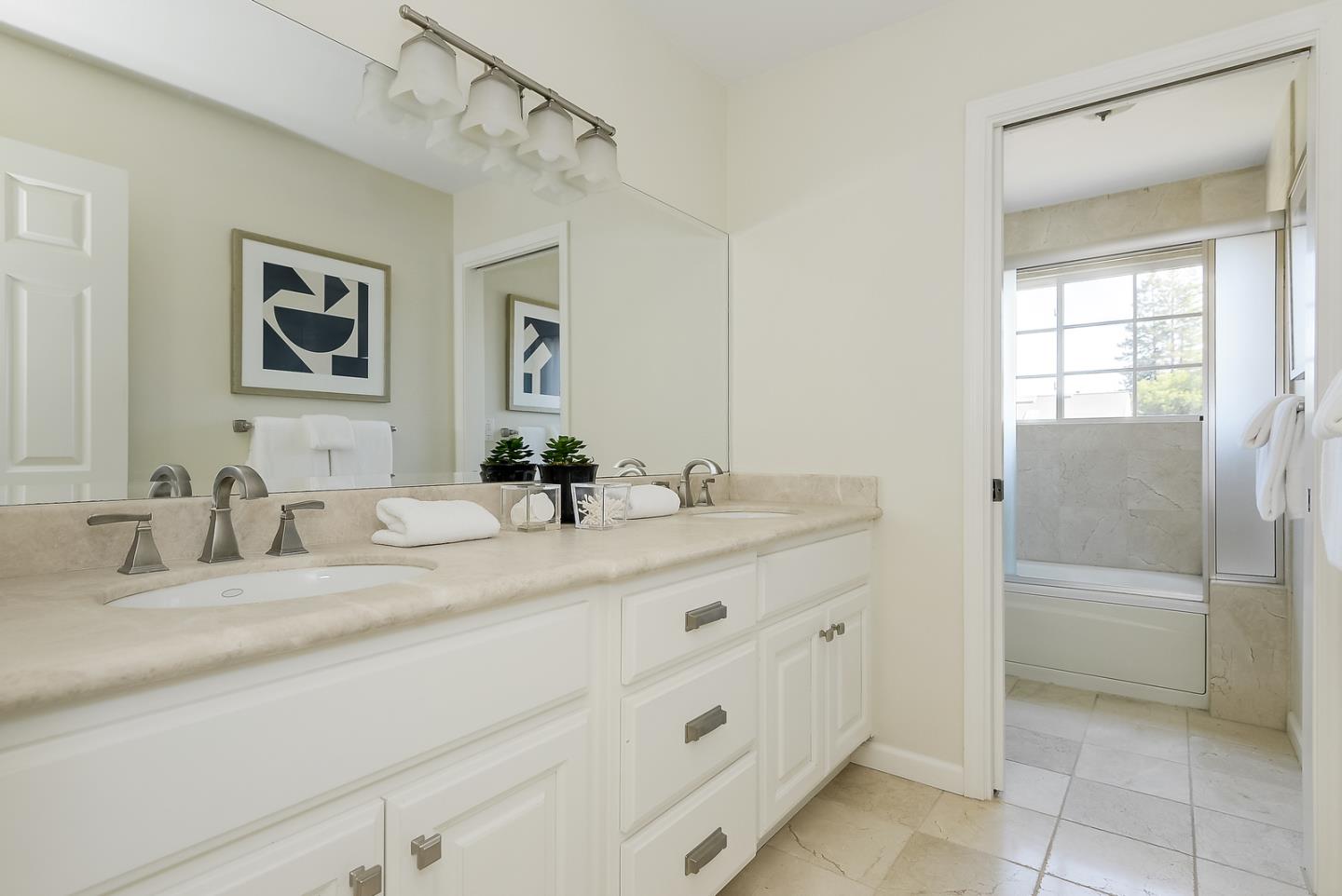 277 Delphi Circle Los Altos, CA 94022 - Photo 24 of 28 a bathroom with a granite countertop sink mirror and bathtub