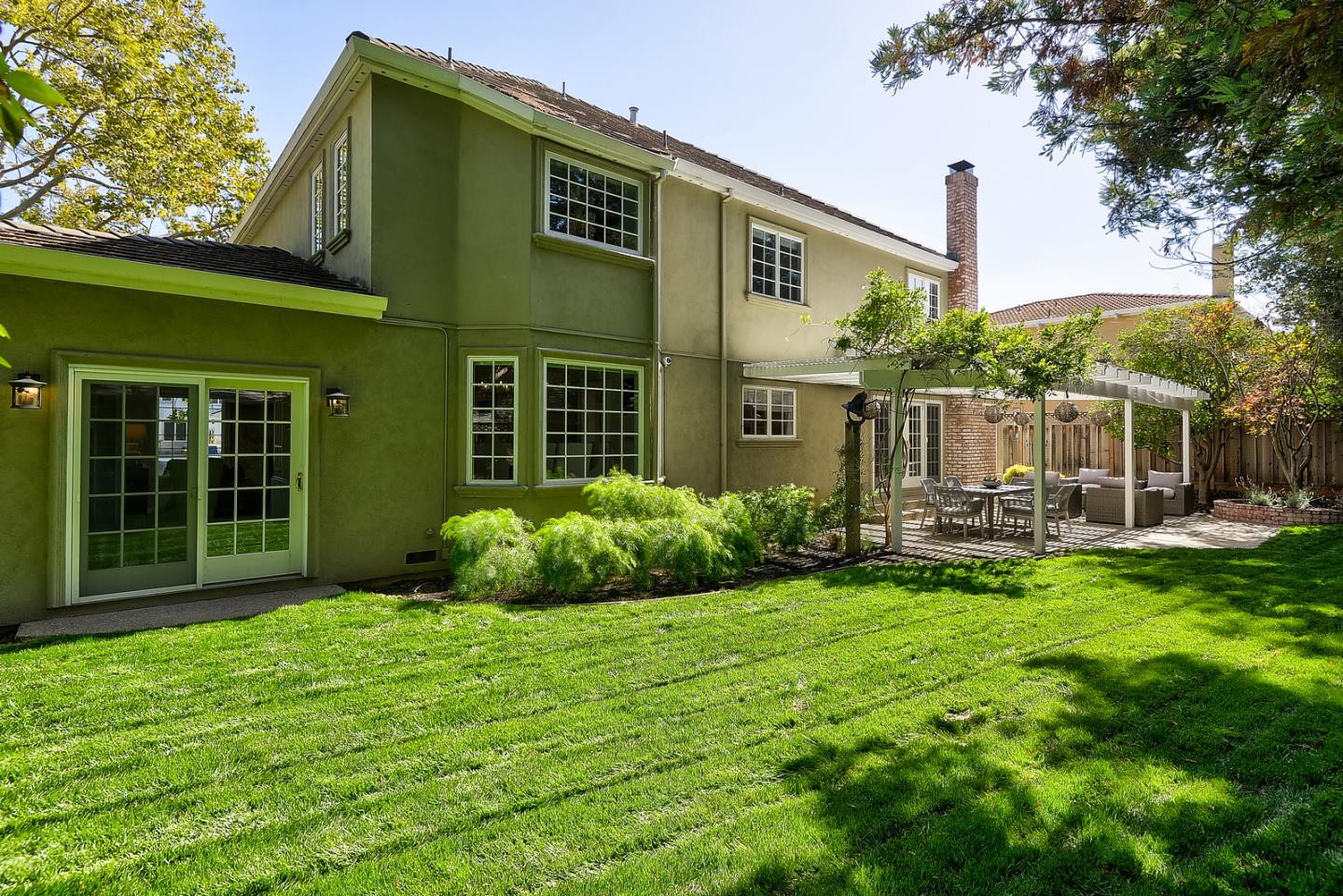 277 Delphi Circle Los Altos, CA 94022 - Photo 27 of 28 a view of a house with backyard sitting area and garden