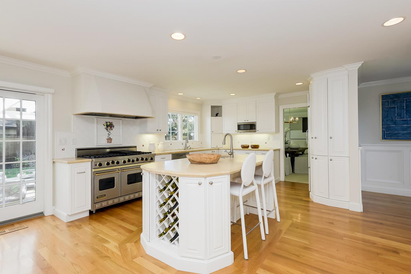 277 Delphi Circle Los Altos, CA 94022 - Photo 6 of 28 a kitchen with a stove a sink and a refrigerator
