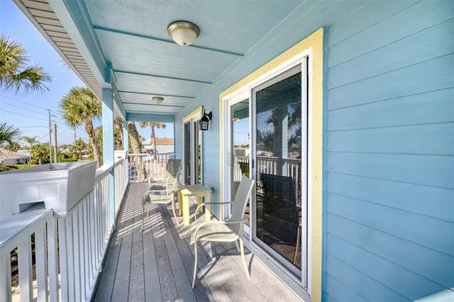 a house with yard and deck