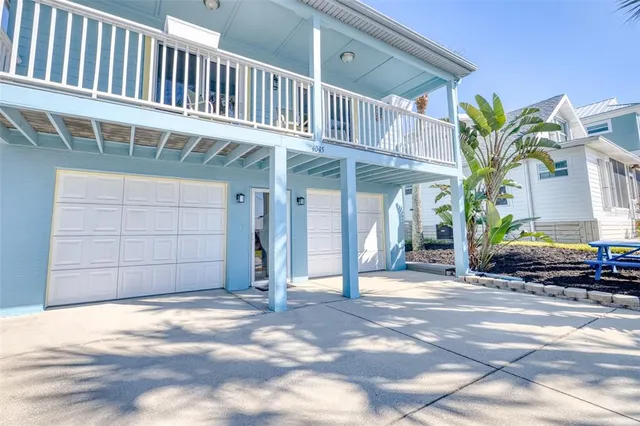a view of a house with a garage