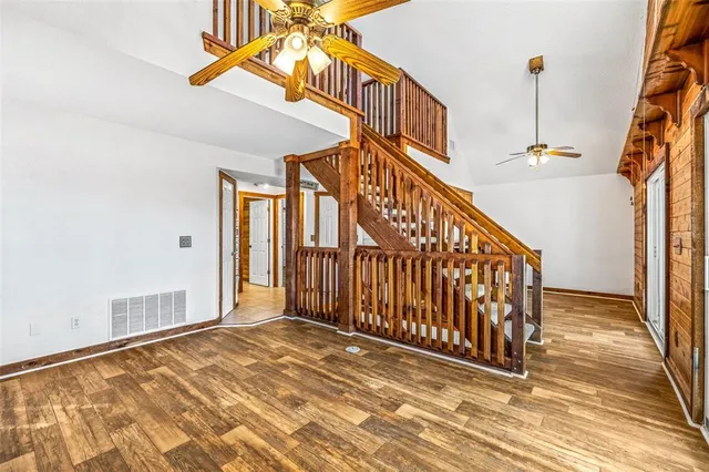 a view of a hallway with staircase