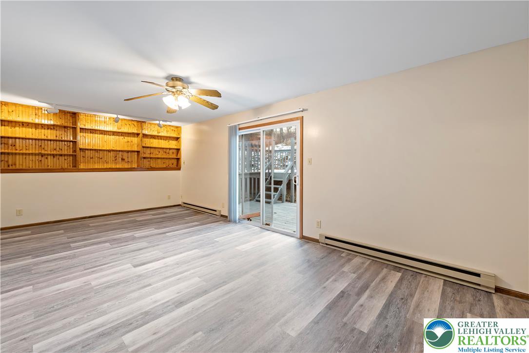 3006 Beddall Street Slatington, PA 18080 - Photo 20 of 31 an empty room with wooden floor and windows