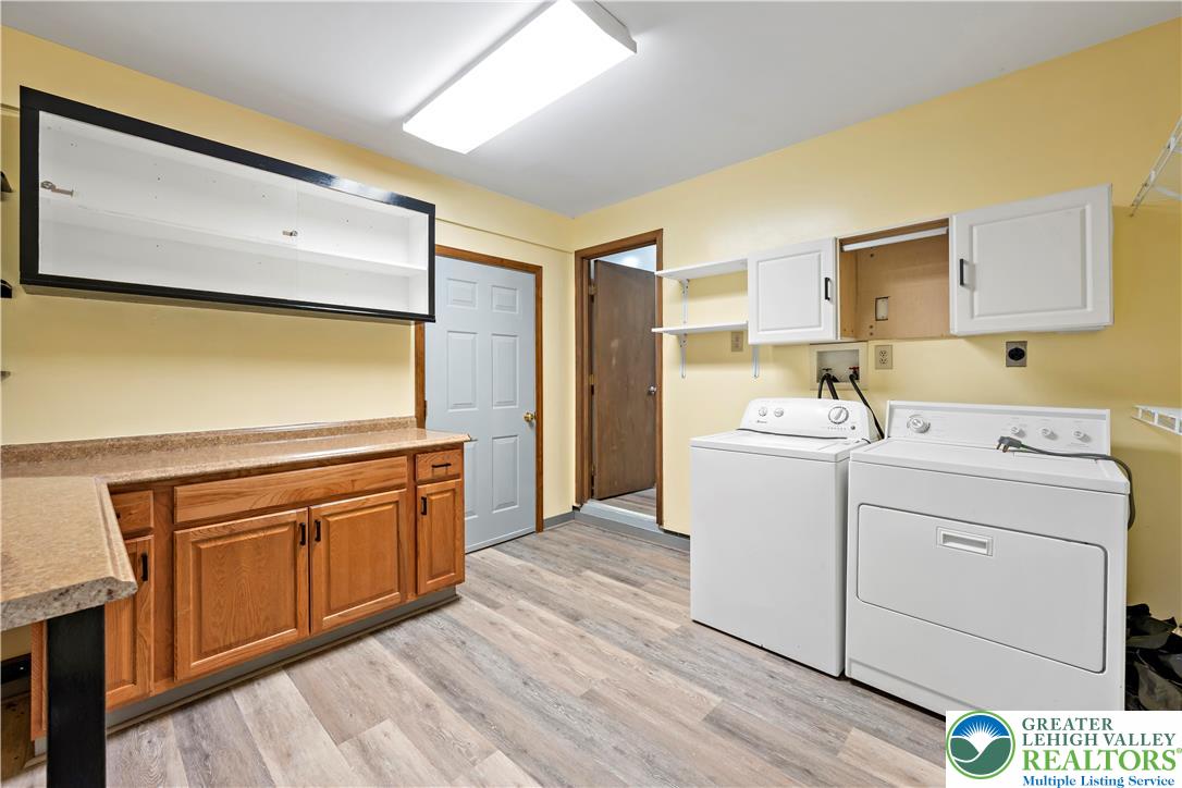 3006 Beddall Street Slatington, PA 18080 - Photo 27 of 31 a view of washer and dryer with wooden floor
