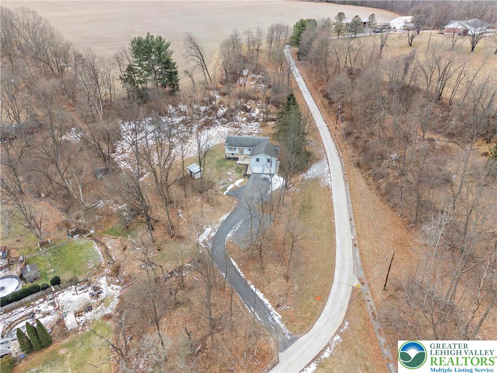 3006 Beddall Street Slatington, PA 18080 - Photo 4 of 31 a view of a balcony with wooden floor and bench