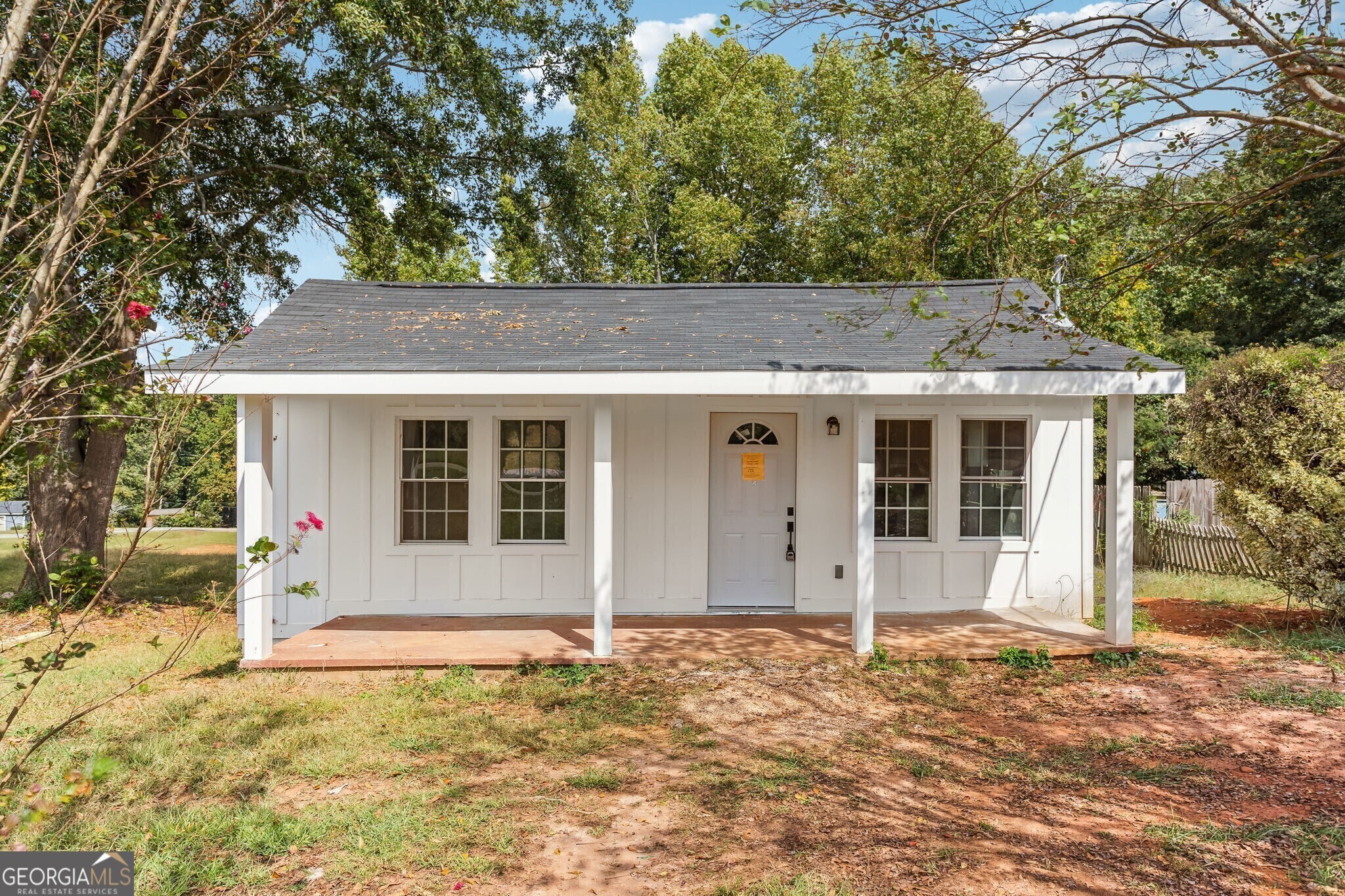 front view of a house with a yard