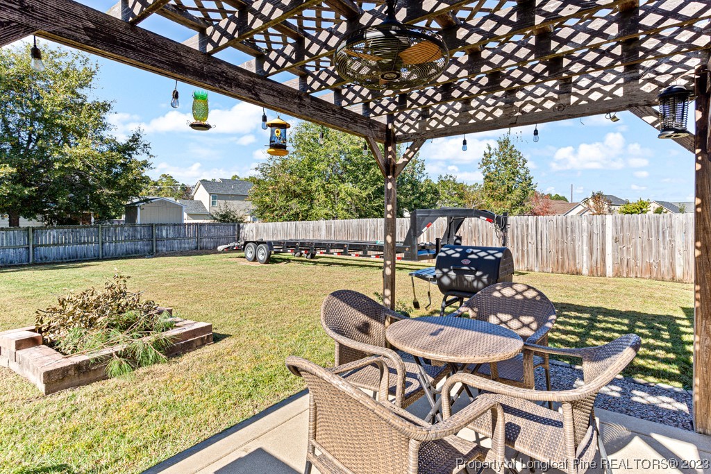 634 Broad Drive Raeford, NC 28376 - Photo 11 of 31 a view of a chairs and table in the patio