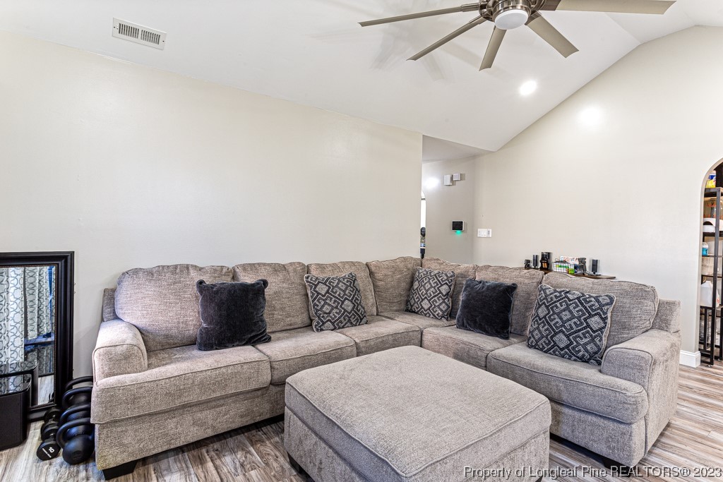 634 Broad Drive Raeford, NC 28376 - Photo 18 of 31 a living room with furniture and a ceiling fan