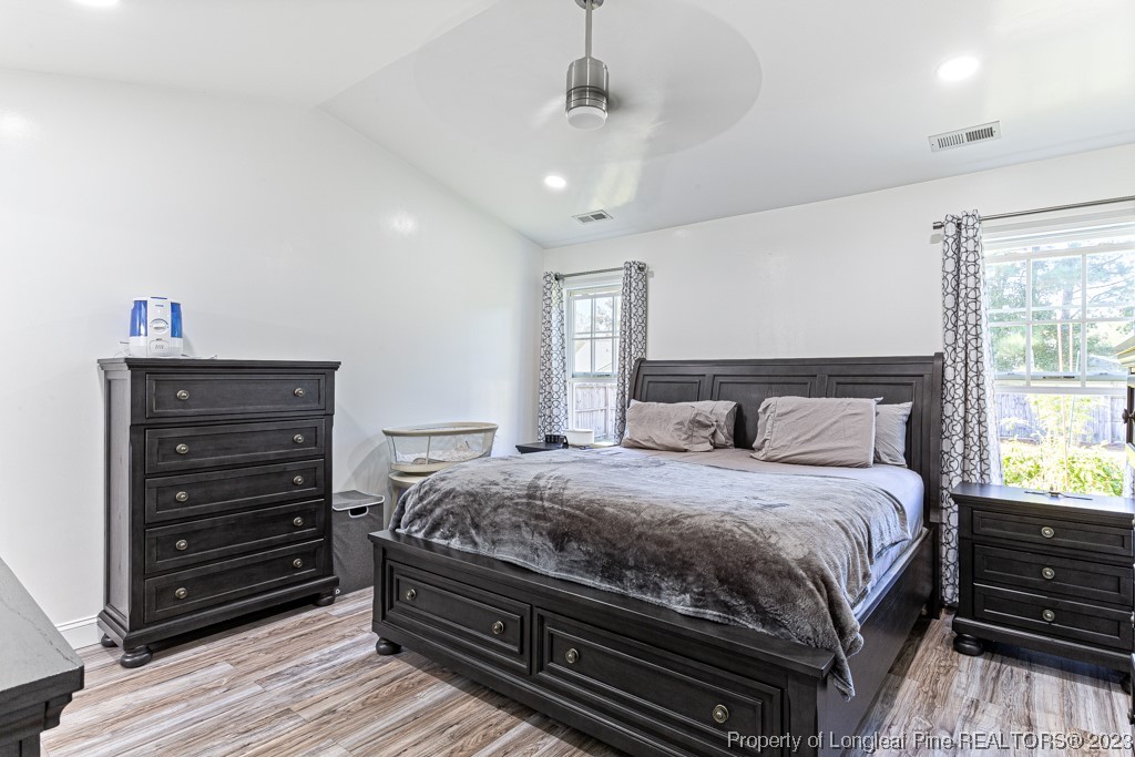 634 Broad Drive Raeford, NC 28376 - Photo 28 of 31 a bedroom with a bed and a dresser