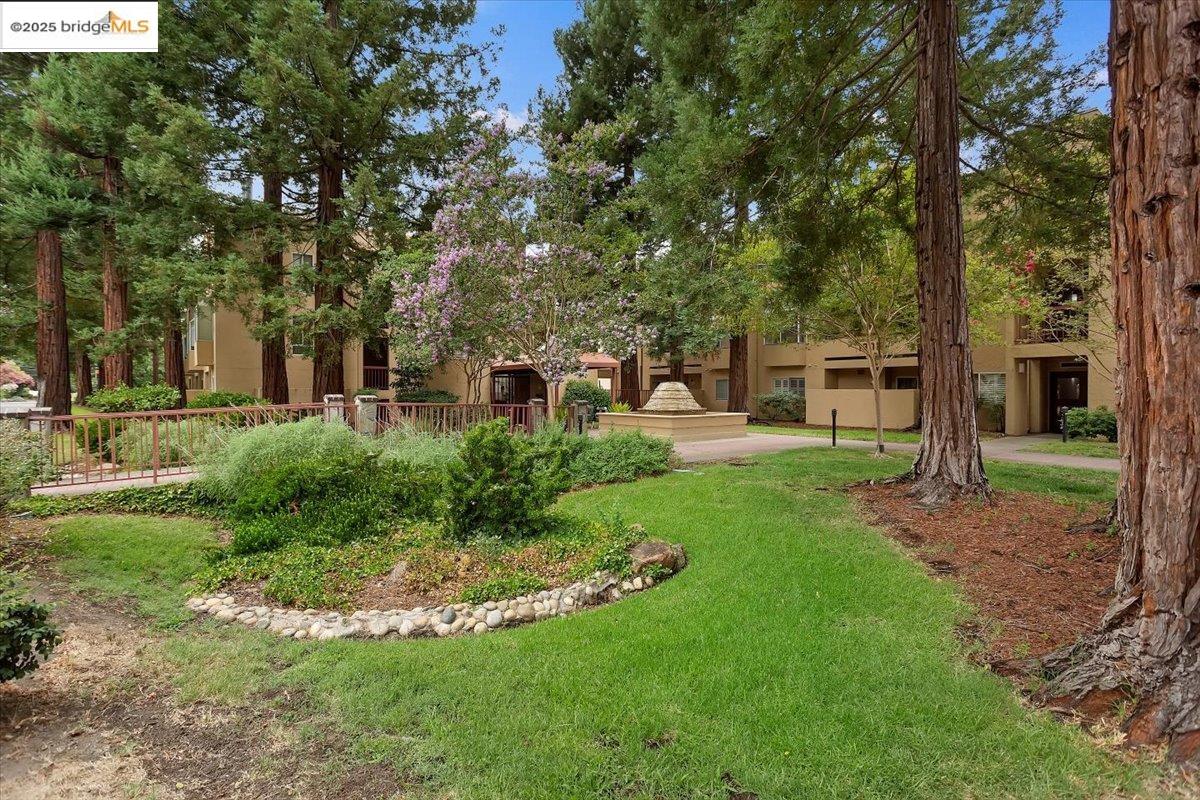 1308 Walden Road, Unit 32 Walnut Creek, CA 94597 - Photo 16 of 43 a view of a house with a backyard