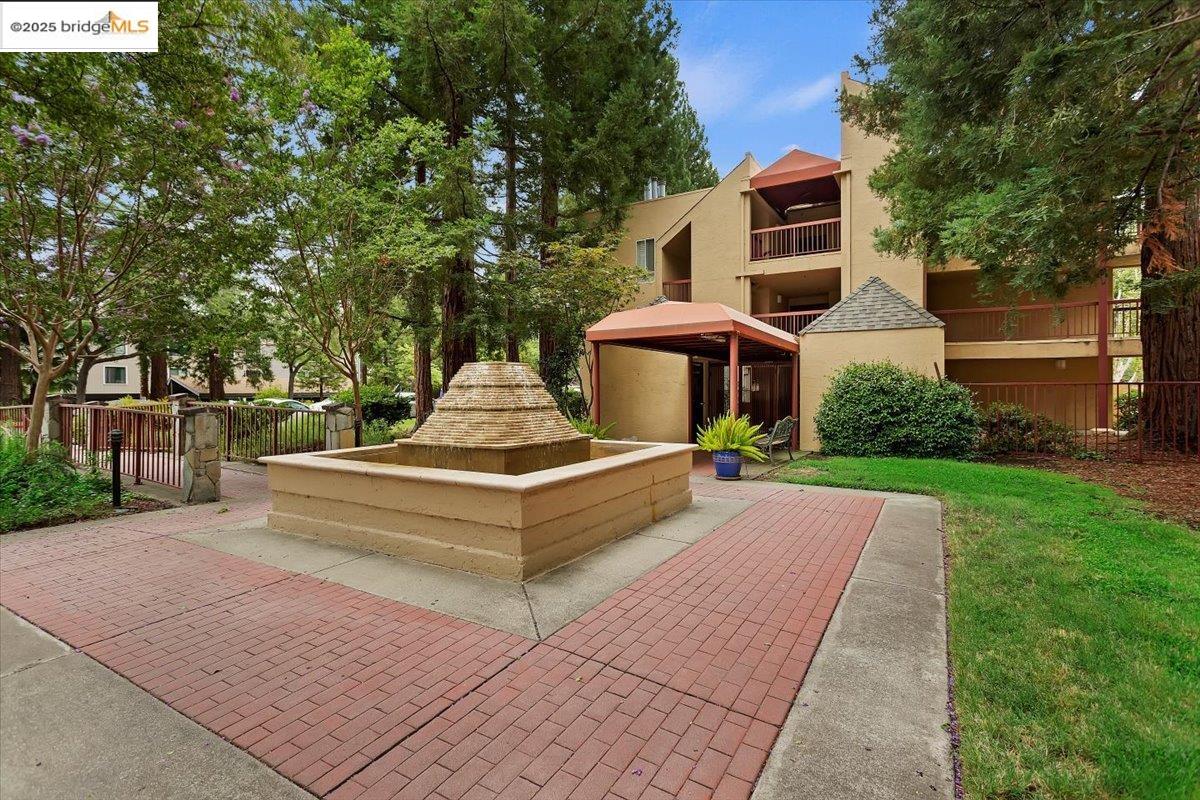 1308 Walden Road, Unit 32 Walnut Creek, CA 94597 - Photo 29 of 43 a front view of a house with garden