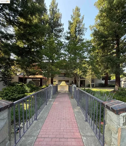 a view of a wooden deck with a bench