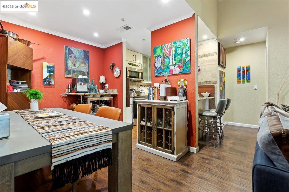 1308 Walden Road, Unit 32 Walnut Creek, CA 94597 - Photo 10 of 43 a large dining space with furniture window and wooden floor