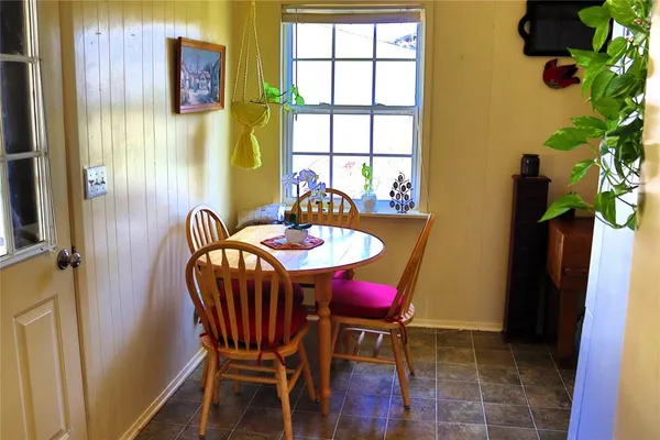 a kitchen with stainless steel appliances a stove a sink and a refrigerator