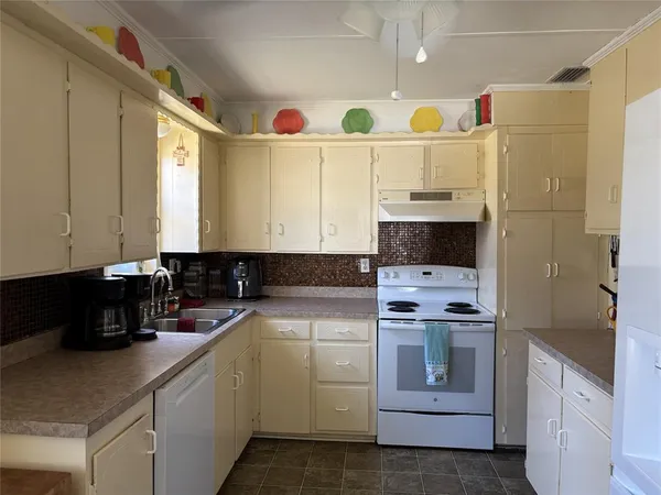 a bedroom with a bed and a table