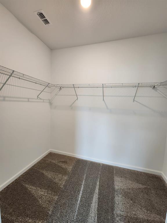 3258 Laurent Loop Davenport, FL 33837 - Photo 16 of 26 a view of a room