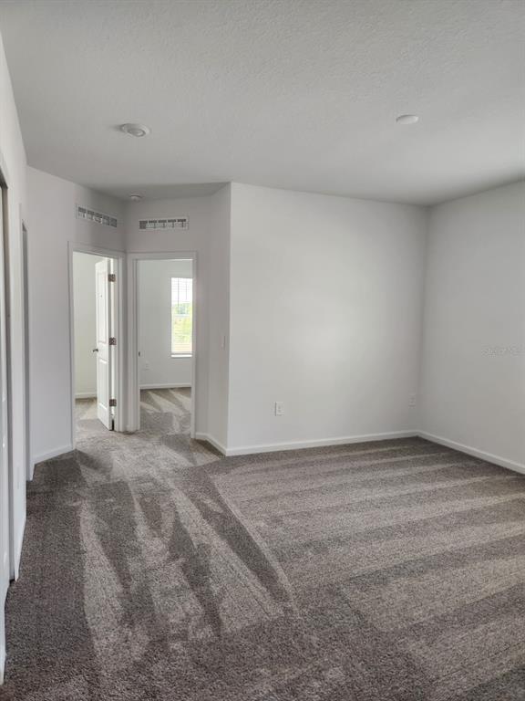 3258 Laurent Loop Davenport, FL 33837 - Photo 9 of 26 a view of an empty room