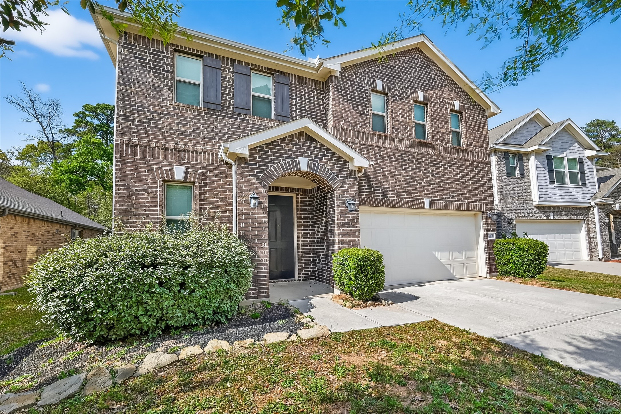 2107 Parnevik Place Conroe, TX 77304 - Photo 5 of 44 In the perfectly placed subdivision of Wedgewood Falls, so close to Lake Conroe