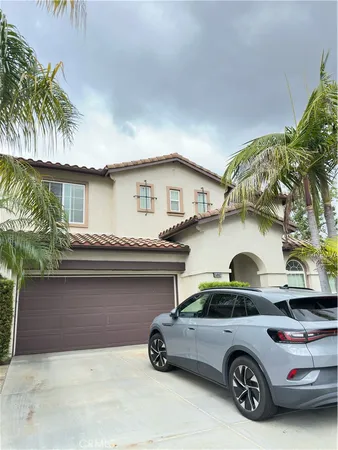 a car parked in front of a house