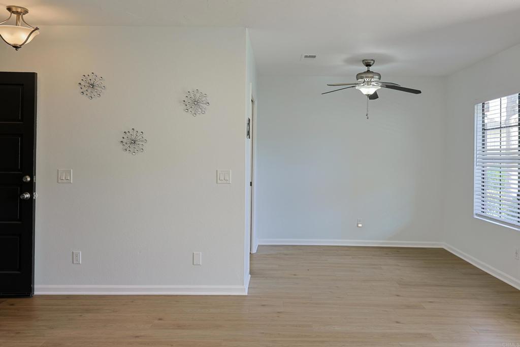 8612 Arminda Circle, Unit 51 Santee, CA 92071 - Photo 16 of 55 an empty room with windows and fan