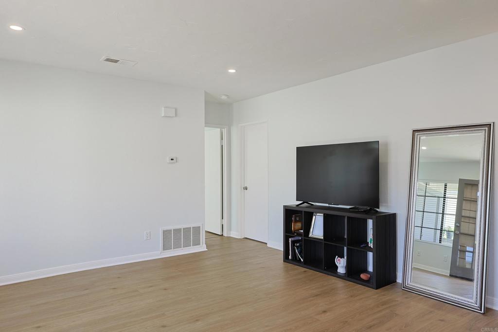 8612 Arminda Circle, Unit 51 Santee, CA 92071 - Photo 18 of 55 a living room with furniture and a flat screen tv