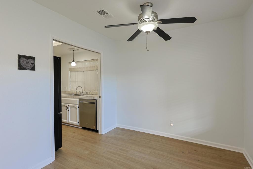 8612 Arminda Circle, Unit 51 Santee, CA 92071 - Photo 23 of 55 an empty room with a bathroom and a ceiling fan