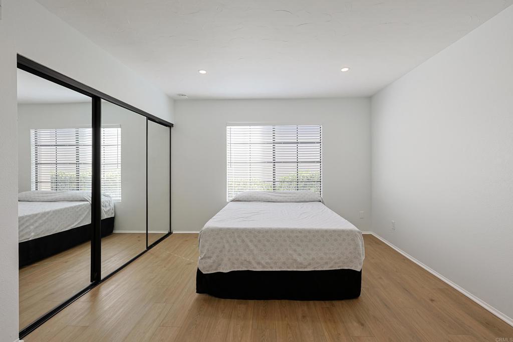8612 Arminda Circle, Unit 51 Santee, CA 92071 - Photo 31 of 55 a bedroom with a bed and a window