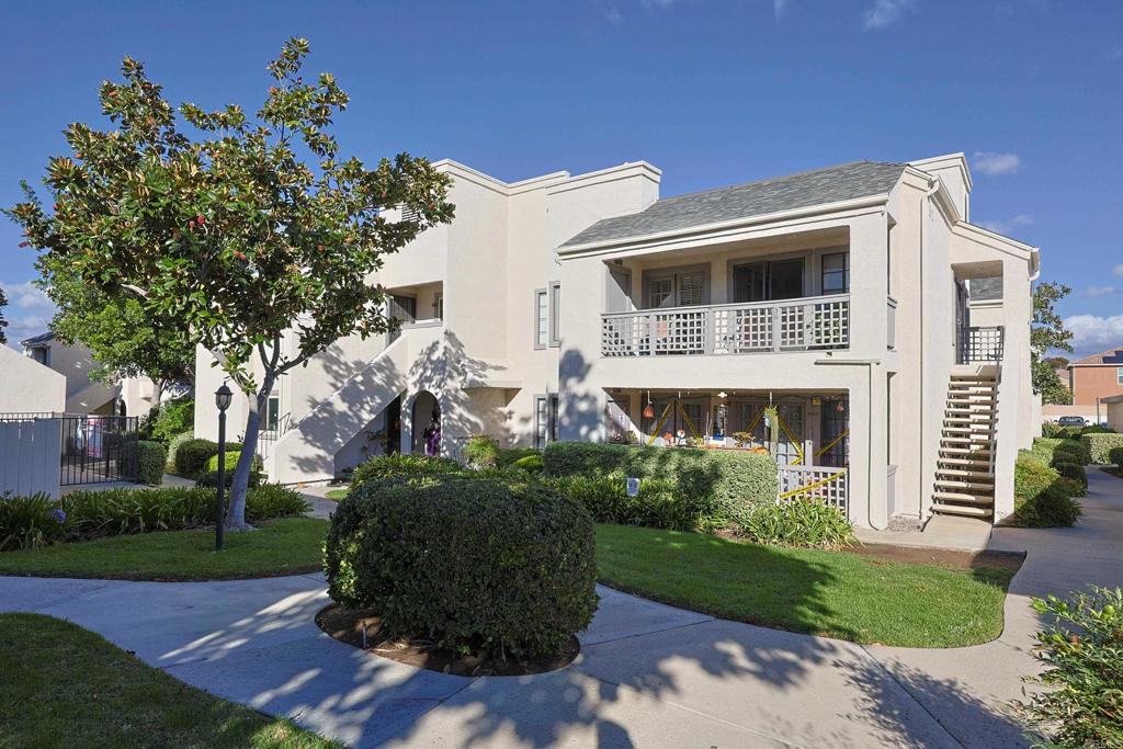 8612 Arminda Circle, Unit 51 Santee, CA 92071 - Photo 49 of 55 a front view of a house with garden