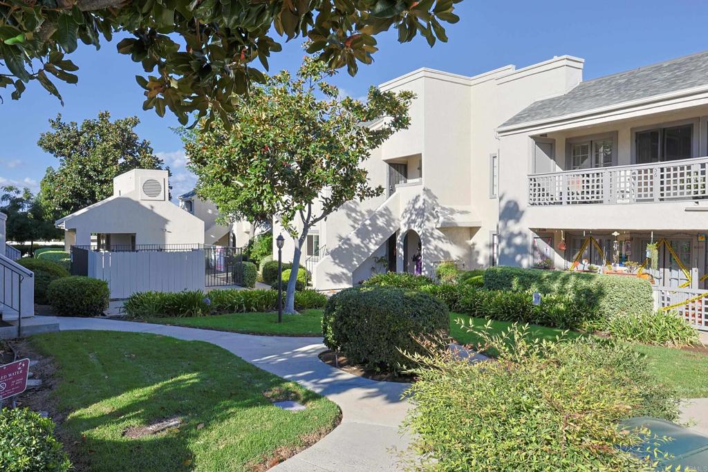 8612 Arminda Circle, Unit 51 Santee, CA 92071 - Photo 50 of 55 a front view of a house with garden
