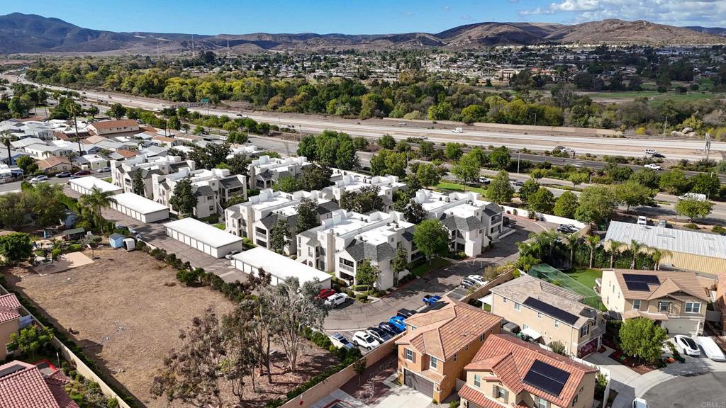 8612 Arminda Circle, Unit 51 Santee, CA 92071 - Photo 6 of 55 an aerial view of residential houses with outdoor space and river