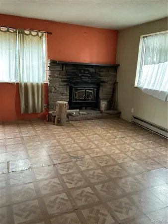 an empty room with windows