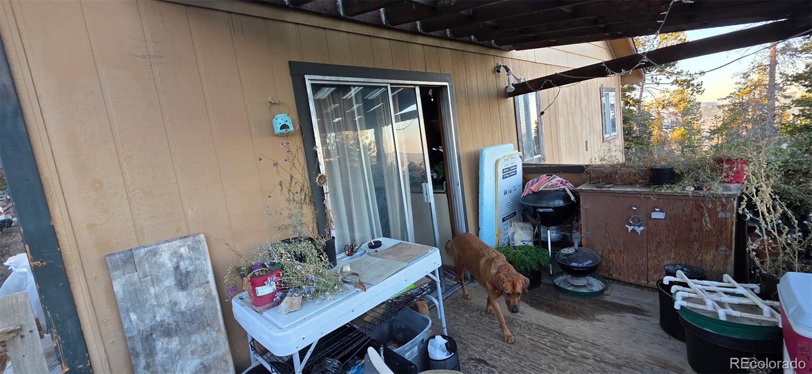 87 Circle Road Golden, CO 80403 - Photo 5 of 15 a outdoor dining space with furniture