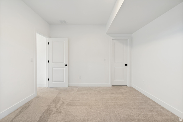 1351 Maple Circle Santaquin, UT 84655 - Photo 39 of 42 Bright interior room featuring neutral carpeting and white painted walls