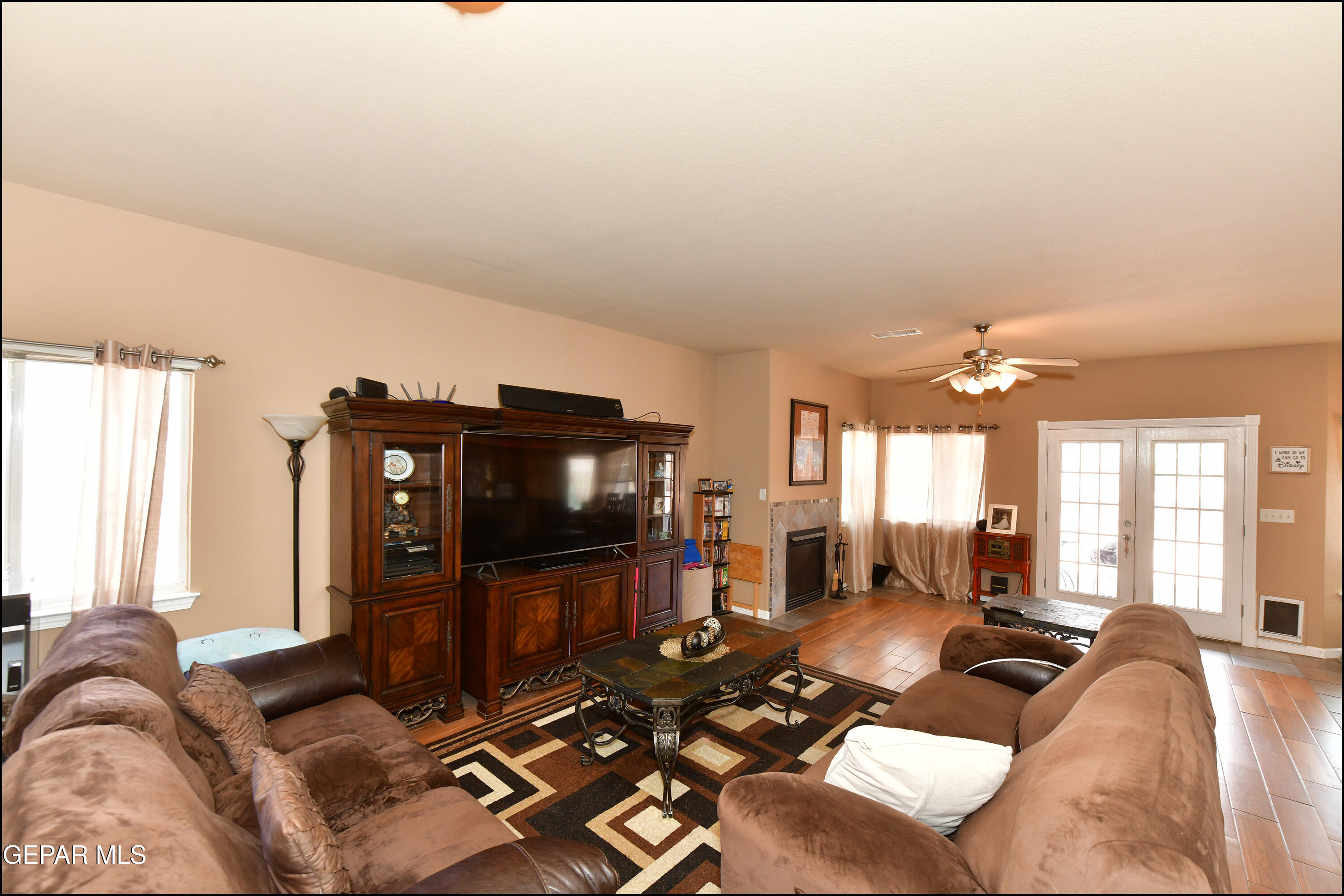 7350 Navidad Way Canutillo, TX 79835 - Photo 21 of 49 a living room with furniture and a flat screen tv