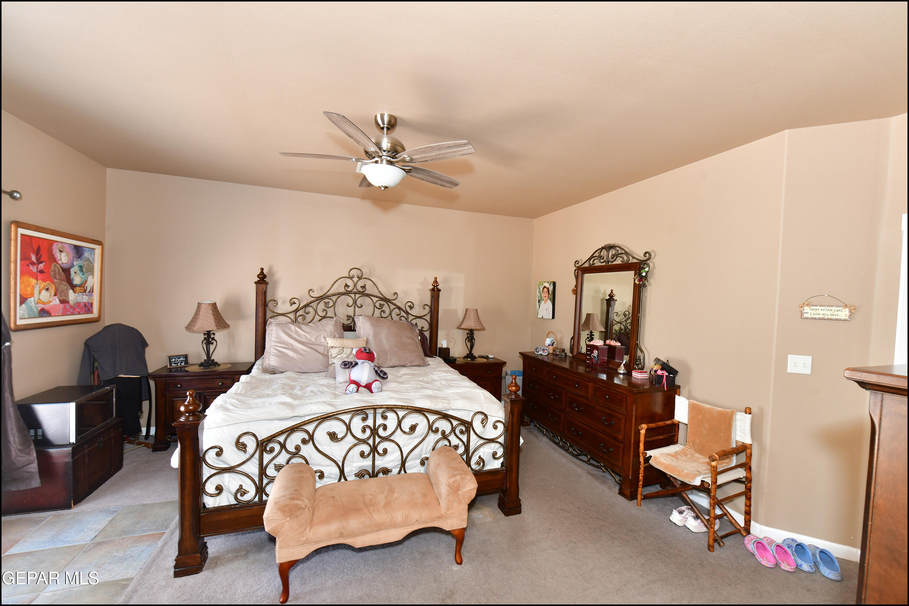 7350 Navidad Way Canutillo, TX 79835 - Photo 25 of 49 a bedroom with furniture and a chandelier