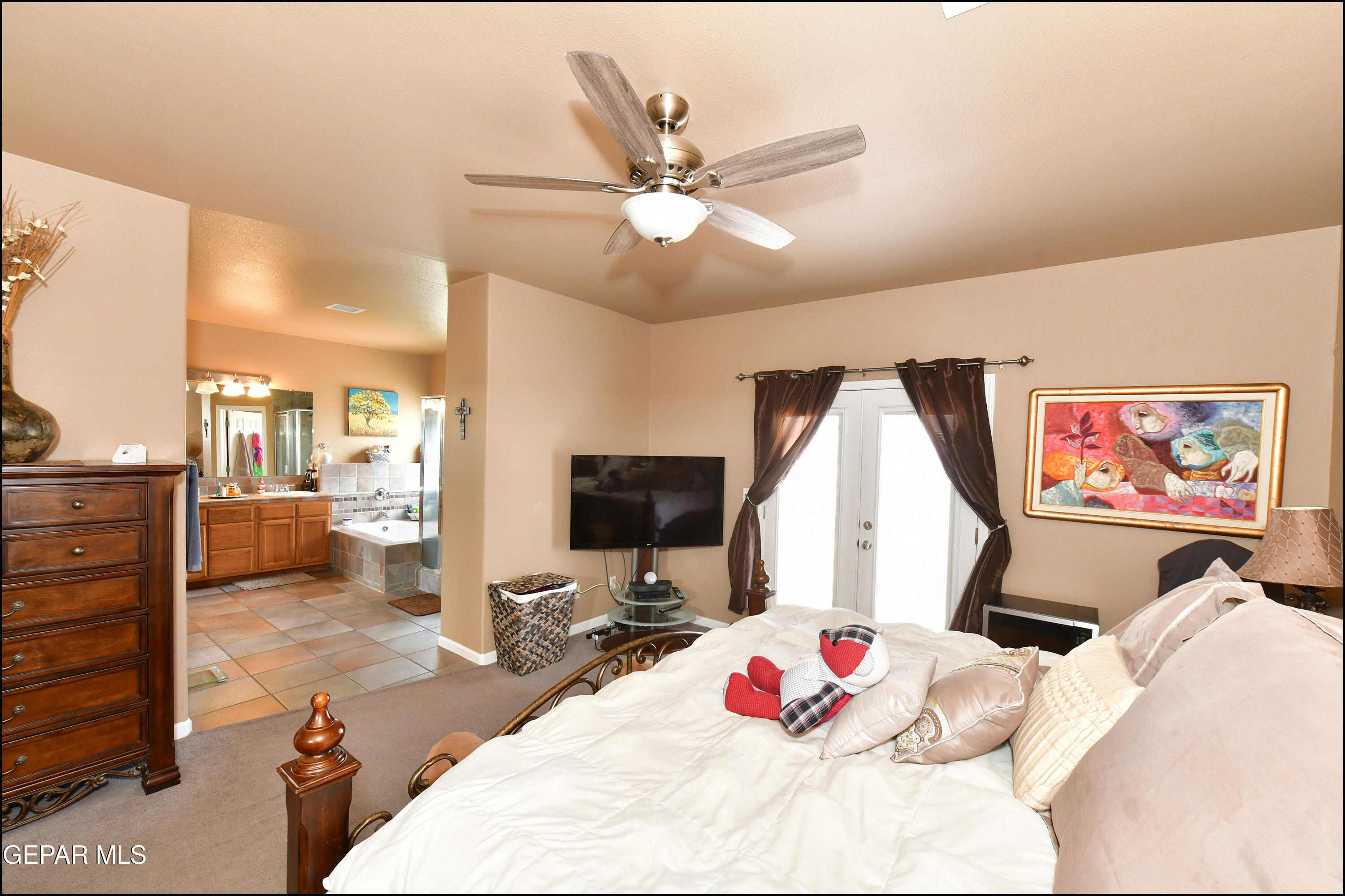 7350 Navidad Way Canutillo, TX 79835 - Photo 26 of 49 a bed room with a bed and a flat screen tv