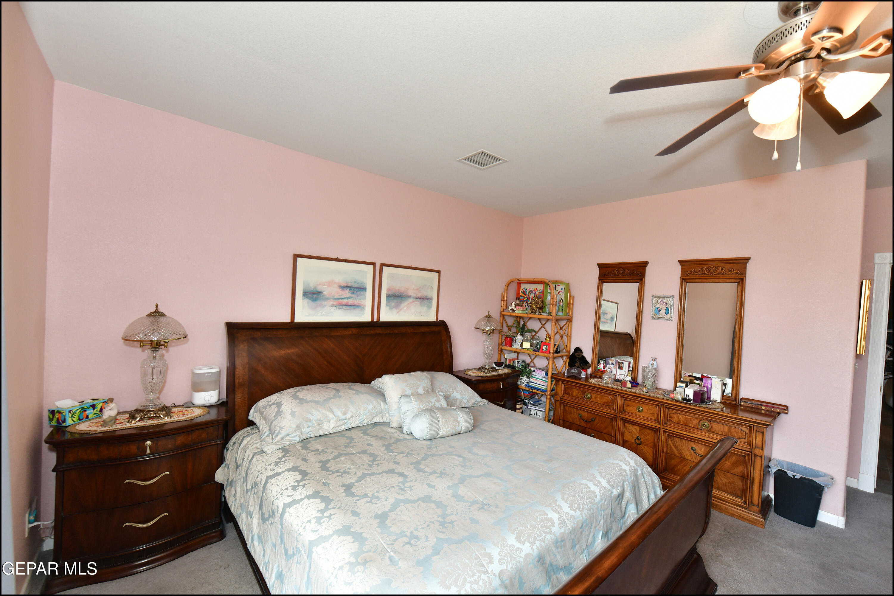 7350 Navidad Way Canutillo, TX 79835 - Photo 33 of 49 a bedroom with a bed and wooden floor