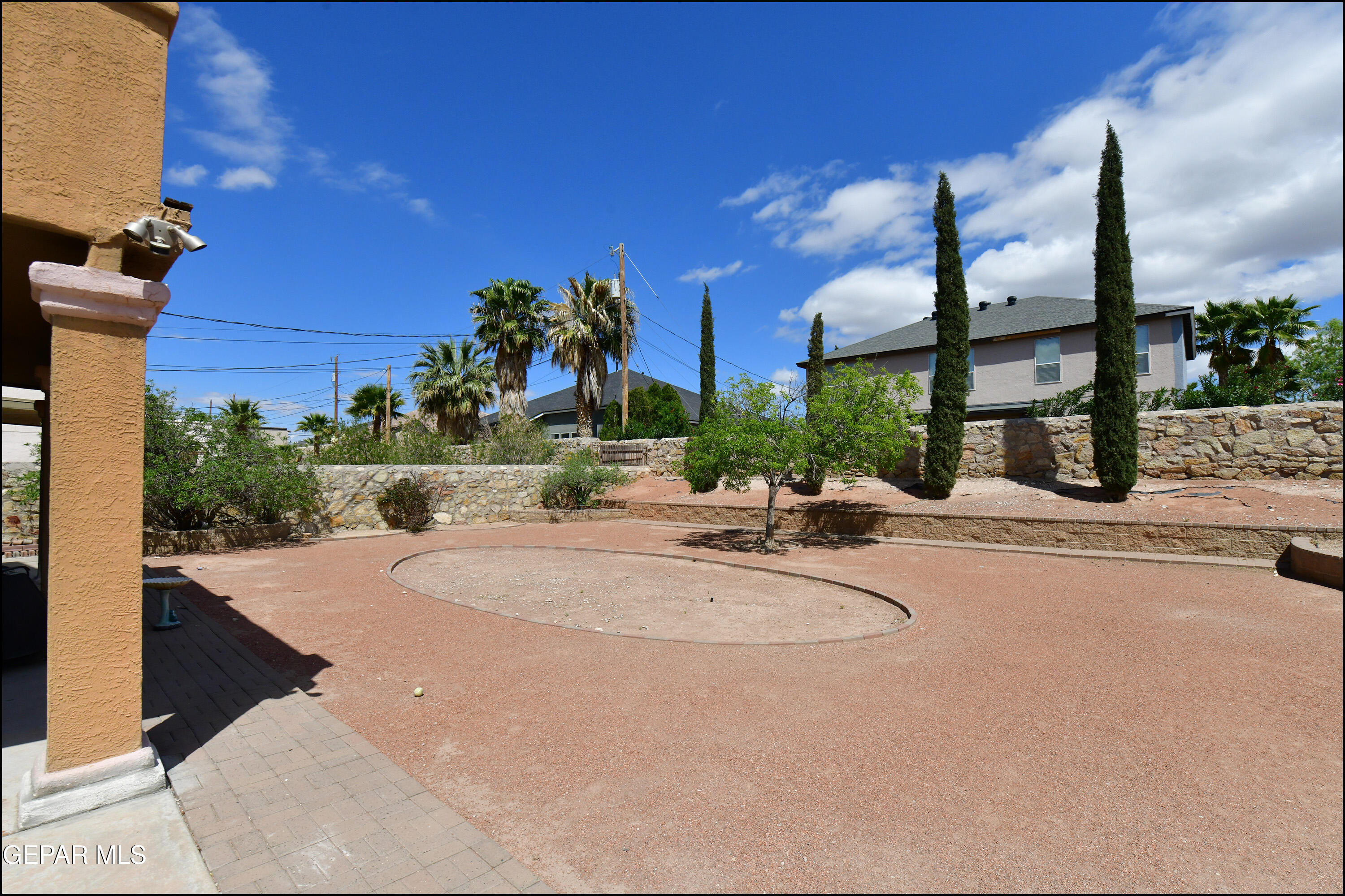 7350 Navidad Way Canutillo, TX 79835 - Photo 44 of 49 a swimming pool with outdoor seating and yard