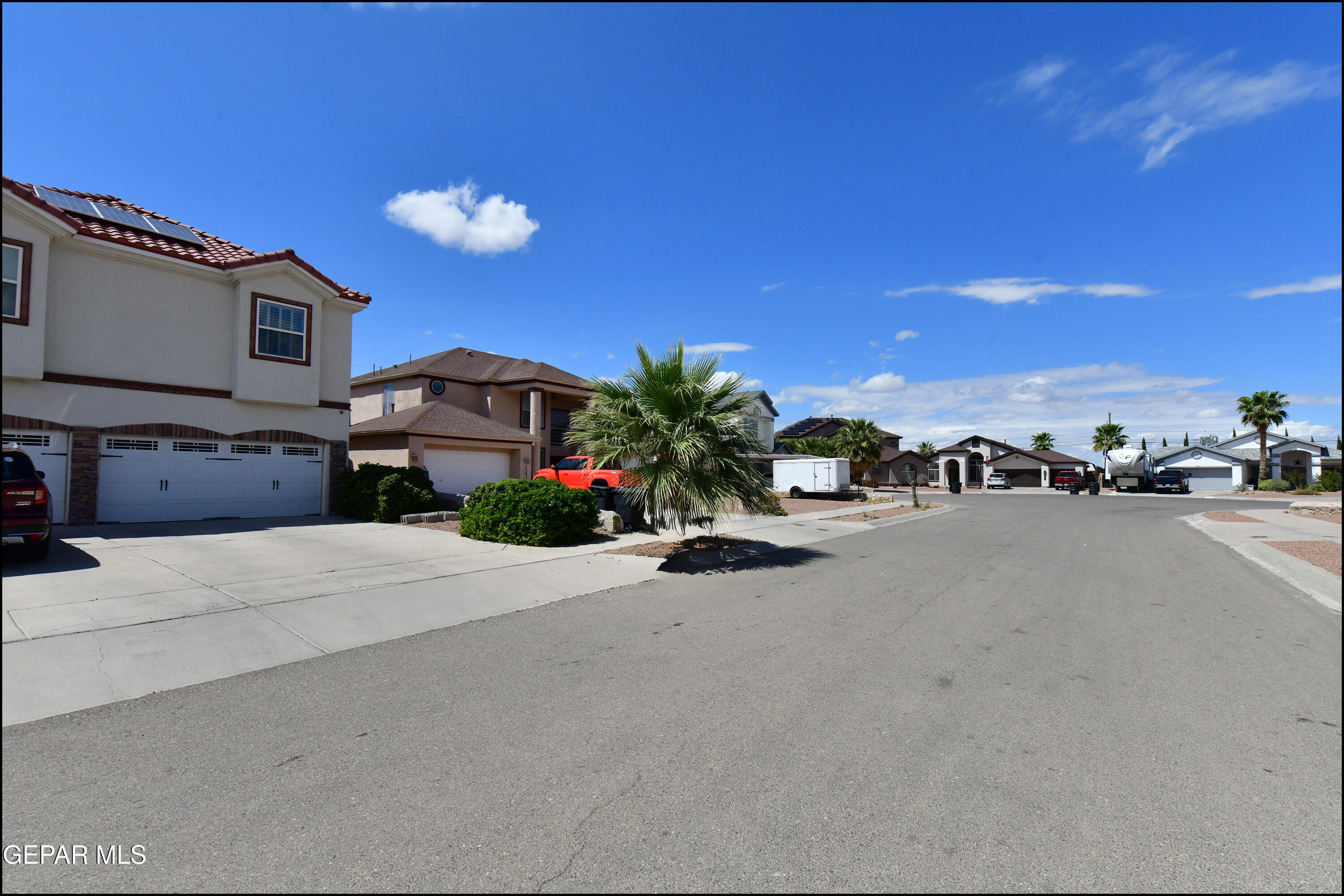7350 Navidad Way Canutillo, TX 79835 - Photo 48 of 49 a group of cars parked in front of a house