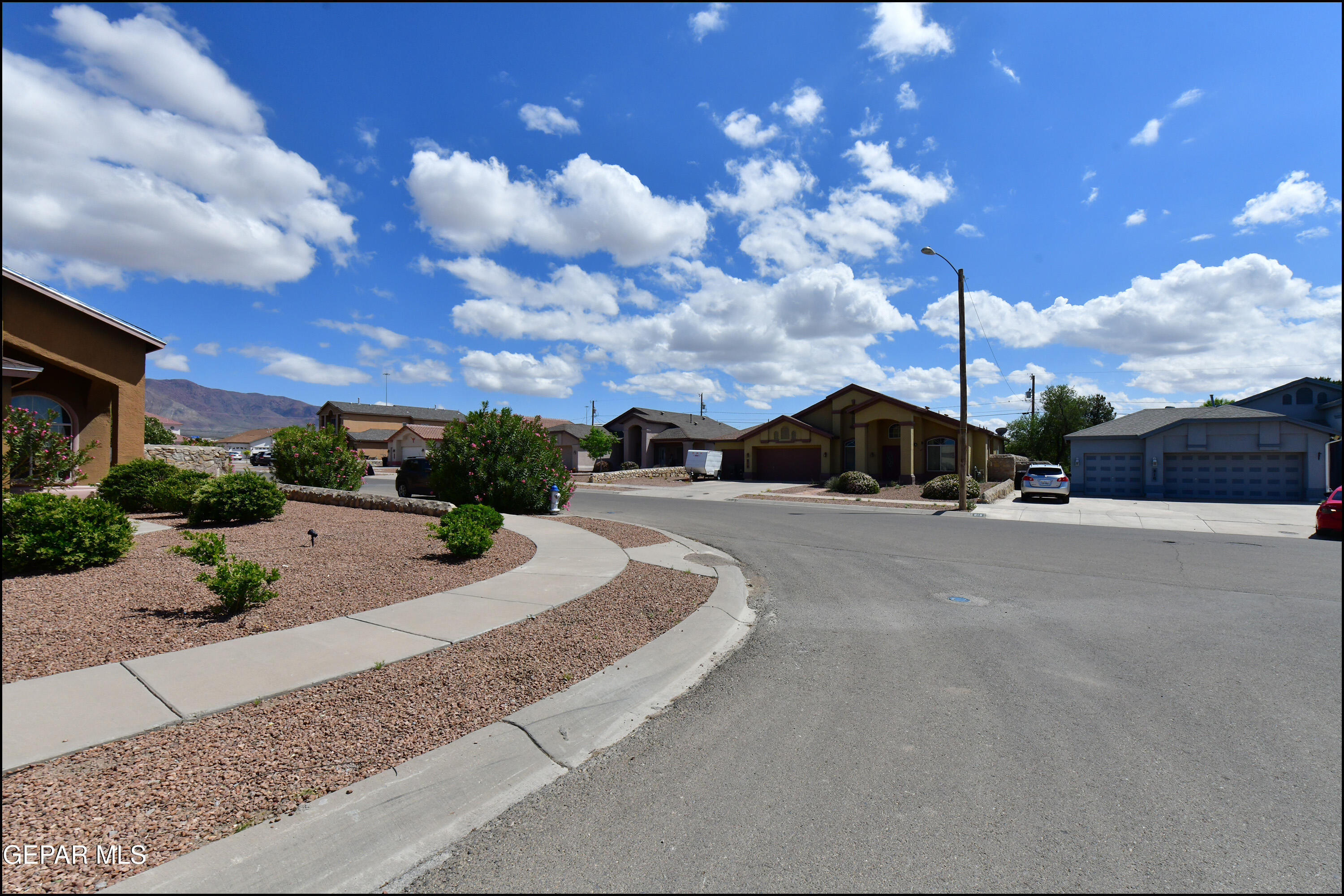 7350 Navidad Way Canutillo, TX 79835 - Photo 49 of 49 a view of a street with a building in the background
