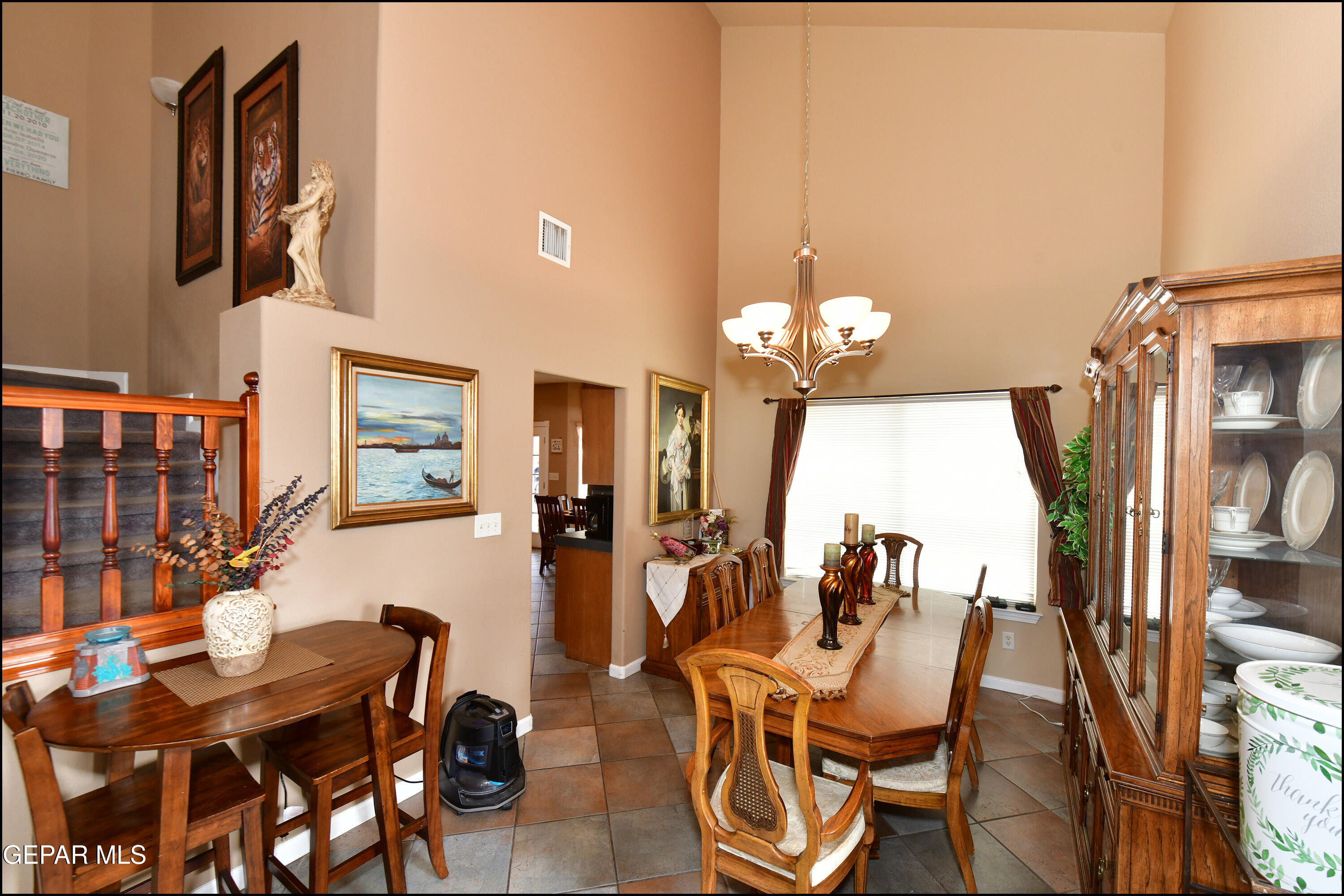 7350 Navidad Way Canutillo, TX 79835 - Photo 8 of 49 a dining room with furniture a chandelier and window