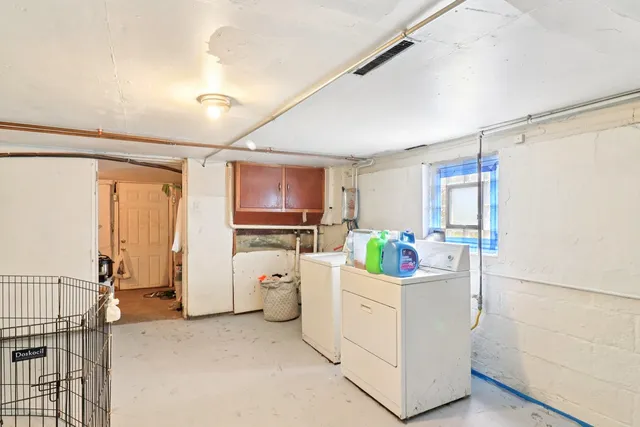 a bathroom with a shower and a tub