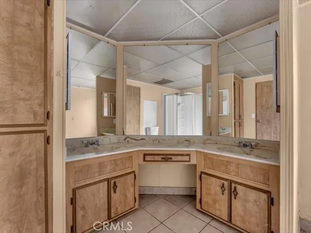 a kitchen with stainless steel appliances a sink and cabinets