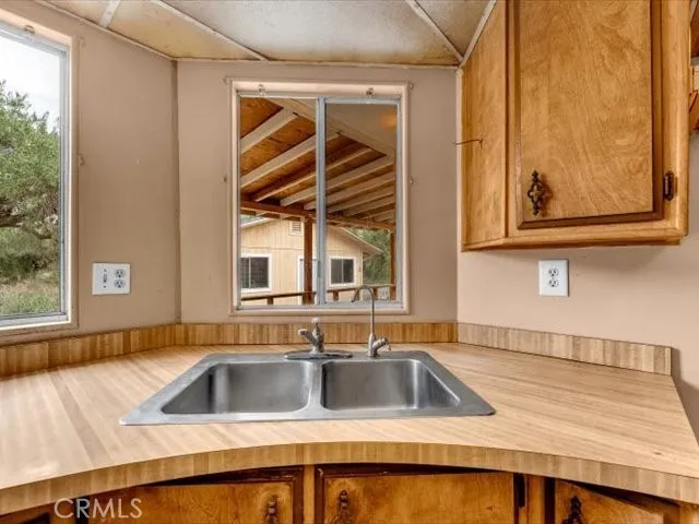 an empty room with wooden floor