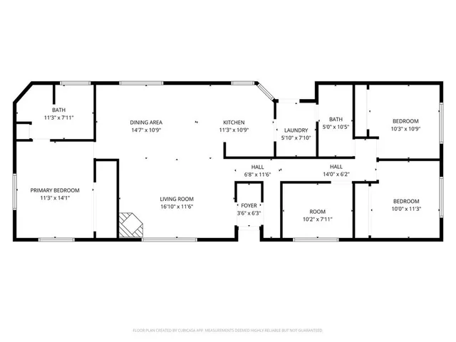 a view of a house with a yard and sitting area