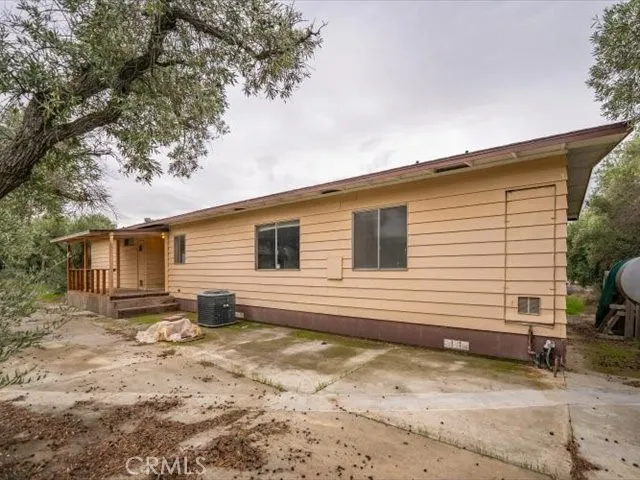 an aerial view of a house with a garden