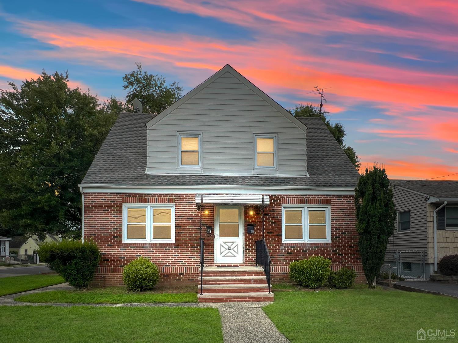48 Riverview Avenue Edison, NJ 08817 - Photo 13 of 19 front view of a house with a yard