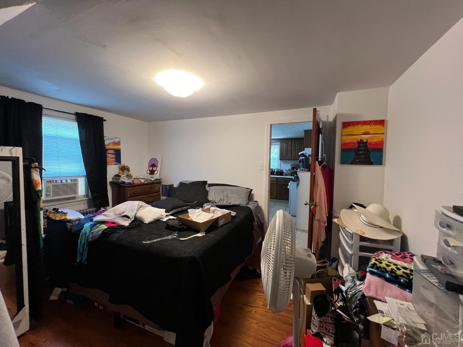 48 Riverview Avenue Edison, NJ 08817 - Photo 18 of 19 a bed room with furniture and a window