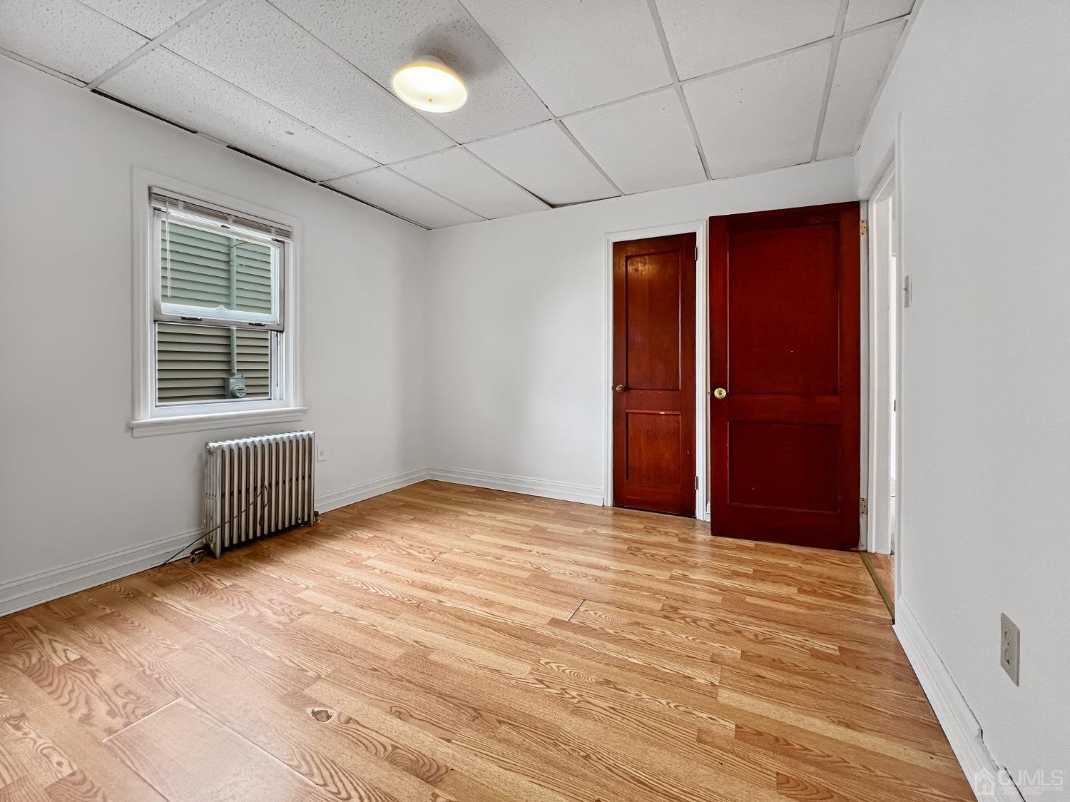 48 Riverview Avenue Edison, NJ 08817 - Photo 7 of 19 a view of an empty room with a window